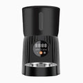 Black automatic pet feeder with digital display and food container showing portion control settings