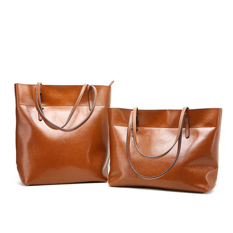 Wax cowhide leather handbag with horizontal design and two compartments
