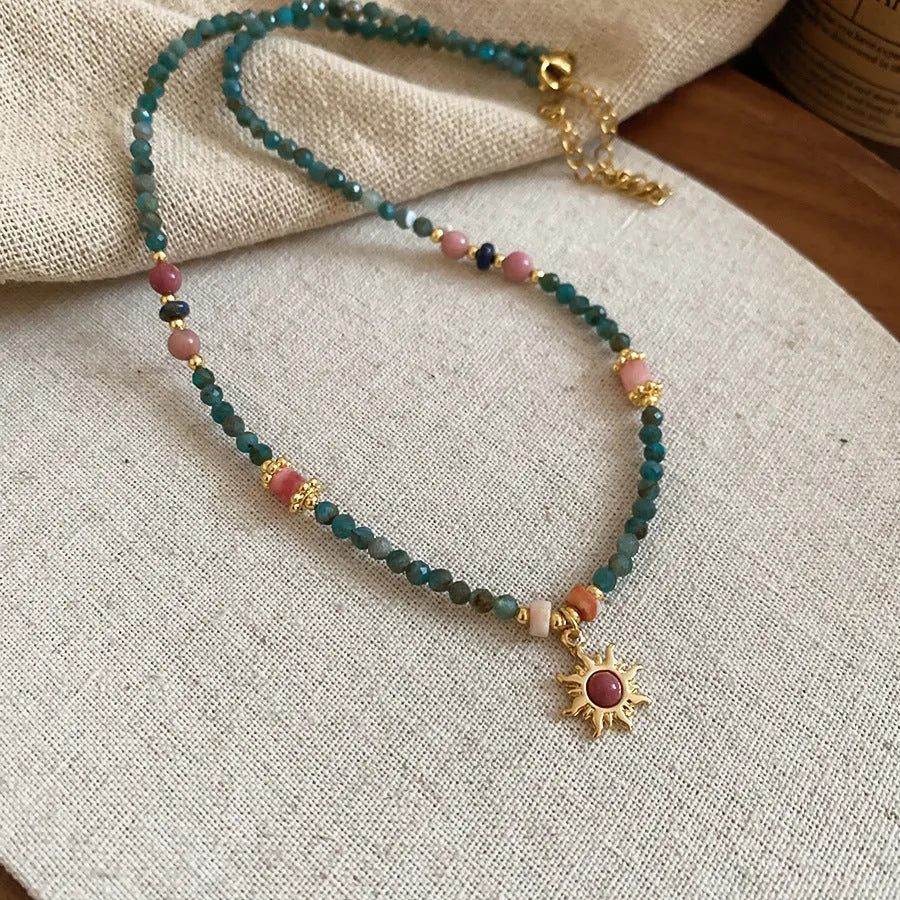 Freshwater pearl necklace with electroplated sun pendant on 41-50 cm clavicle chain