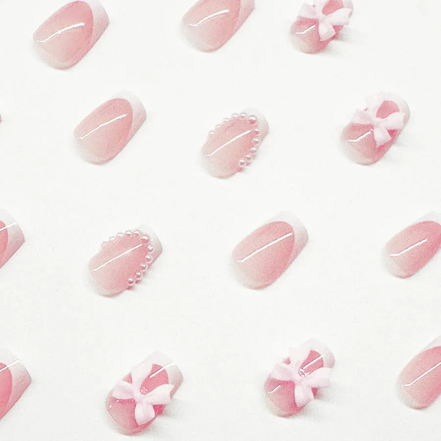 Short square white French manicure nail art set with bow designs and gel adhesive