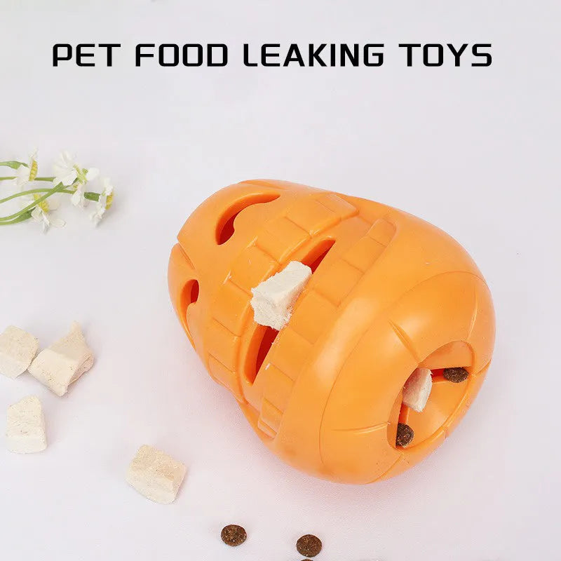 Orange Halloween pumpkin shaped rubber dog toy with a central treat-dispensing funnel.