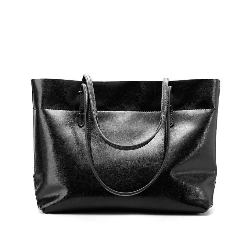 Wax cowhide leather handbag with horizontal design and two compartments