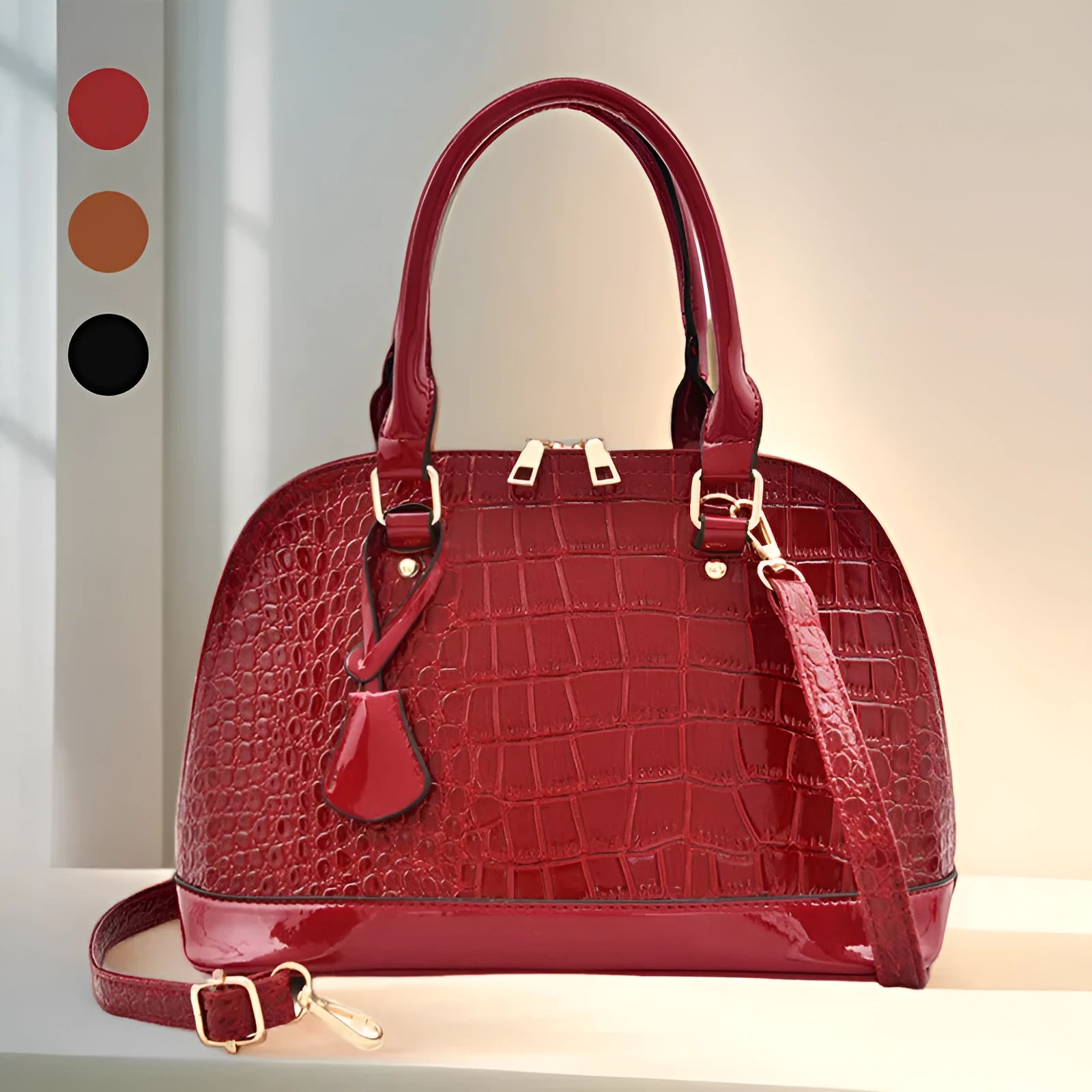 Large shiny black PU crossbody bag with a structured shell shape