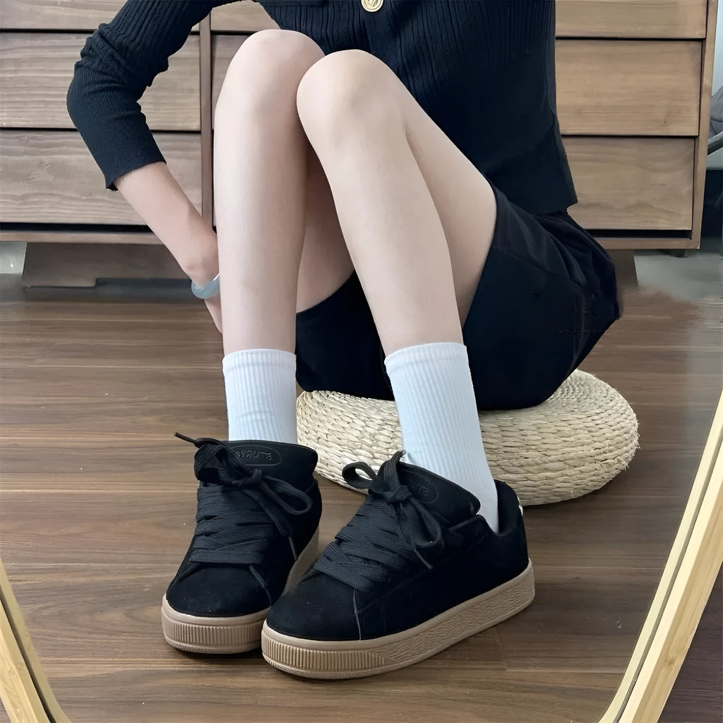 Black retro low-top sneakers with waterproof platform sole and artificial PU upper