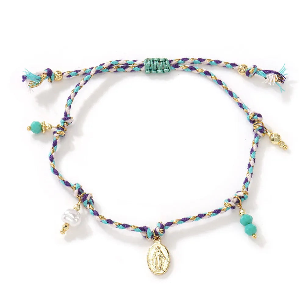 Close-up of a colourful hand-woven braided rope bracelet for women in ethnic style.