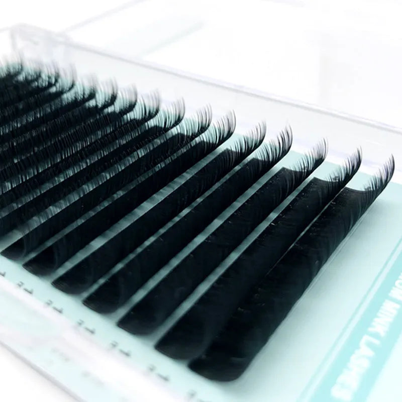 Artificial fibre false eyelashes showing length options from 7mm to 15mm with thickness specifications