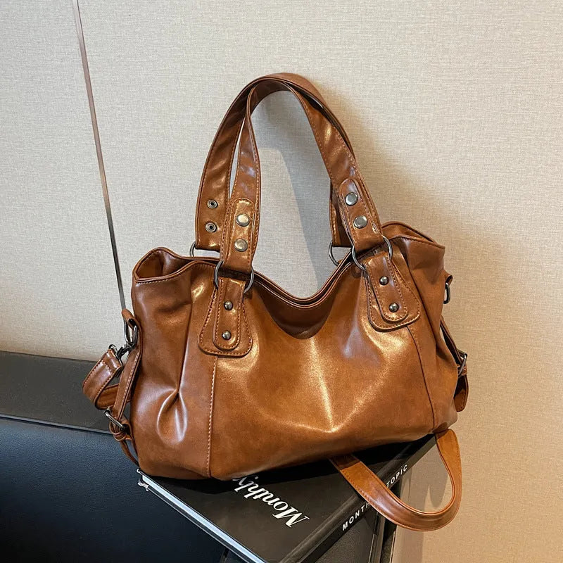 Large capacity women's messenger bag in soft PU leather, horizontal square shape, with double shoulder straps, available in multiple colours