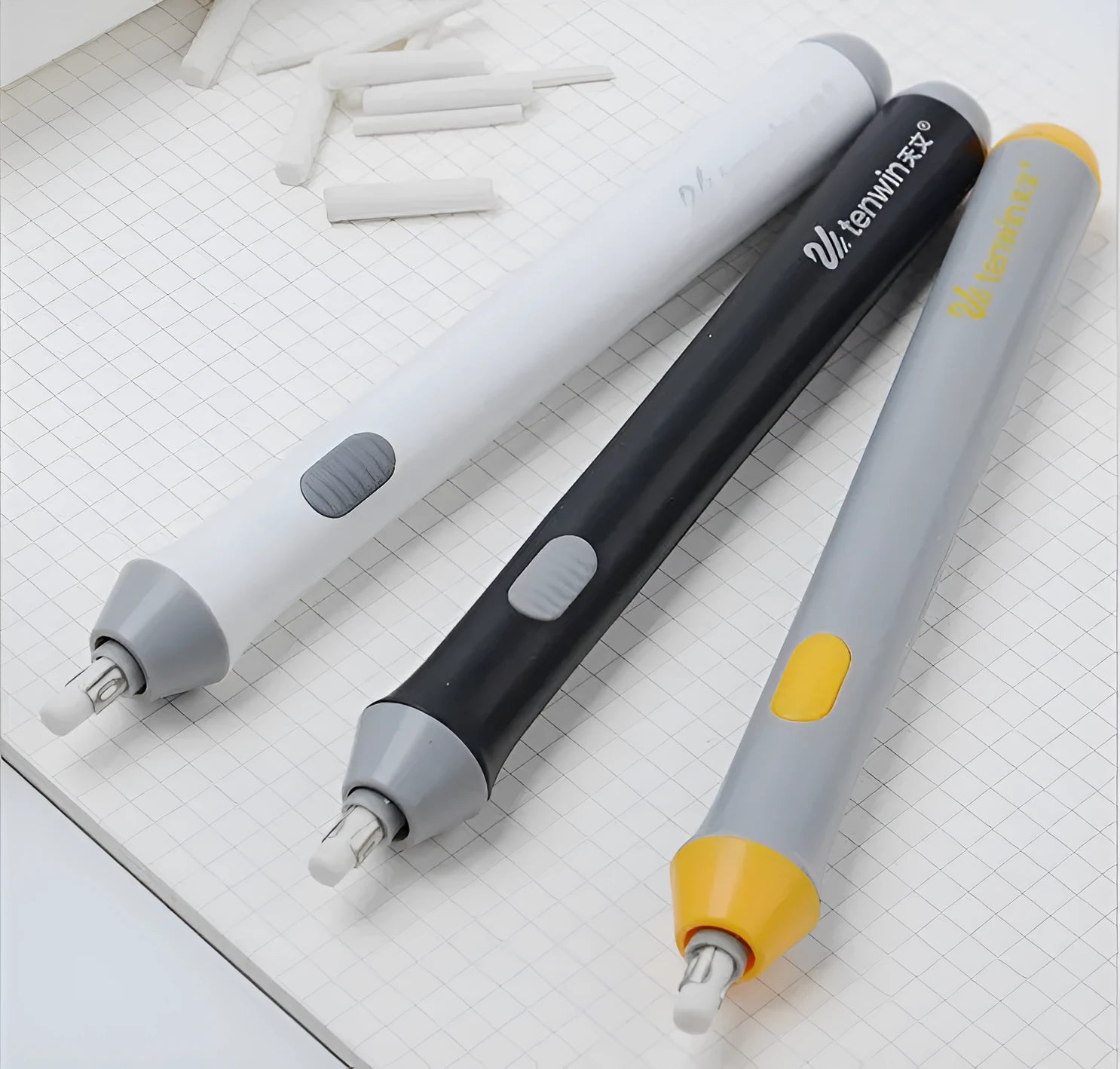 Black and gray electric eraser with plastic body, 166x15 mm, on a white background