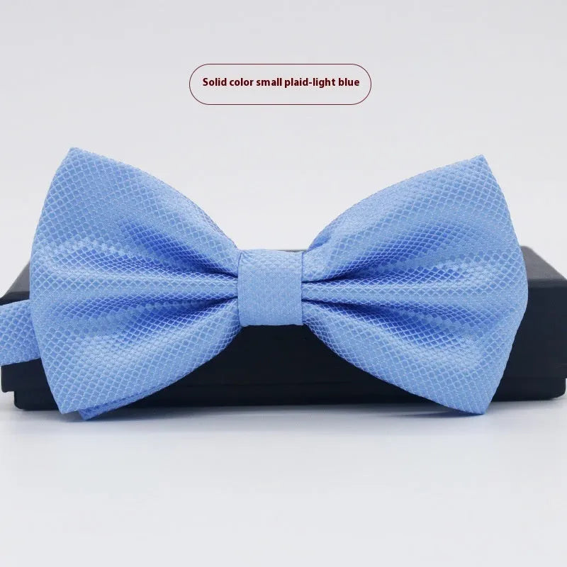 Solid colour polyester bow tie with flat head design measuring 12cm by 6cm