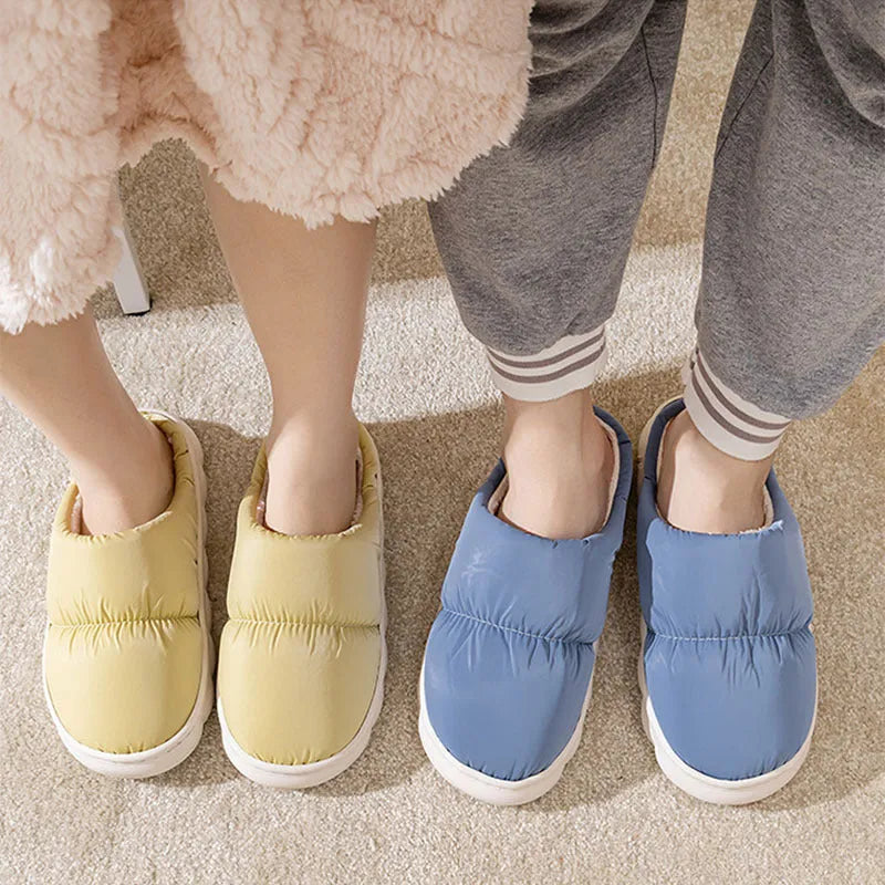 Down cotton winter slippers with artificial leather upper, thick rubber sole, and plush lining in blue colour