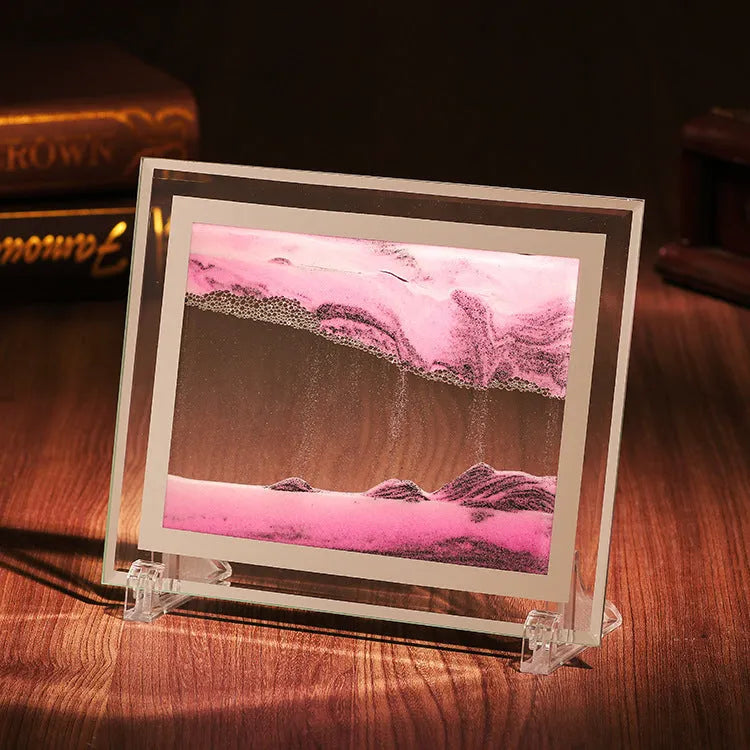 Geometric glass ornament with internal landscape quicksand painting in black, white and green colours.