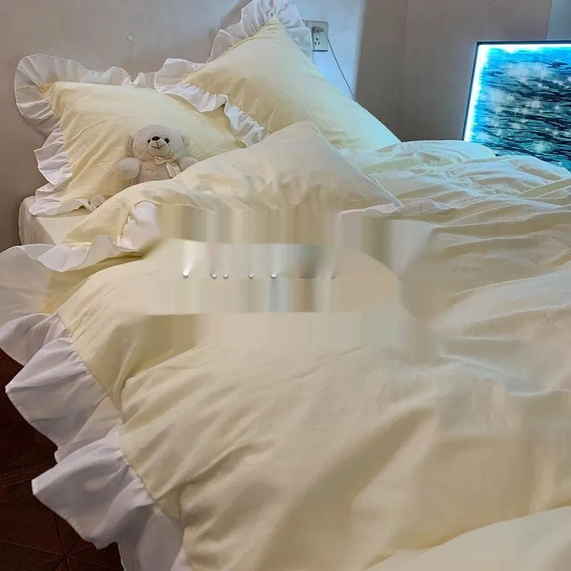 Solid colour washed linen quilt cover and pillowcases from a mori style four-piece bedding set.
