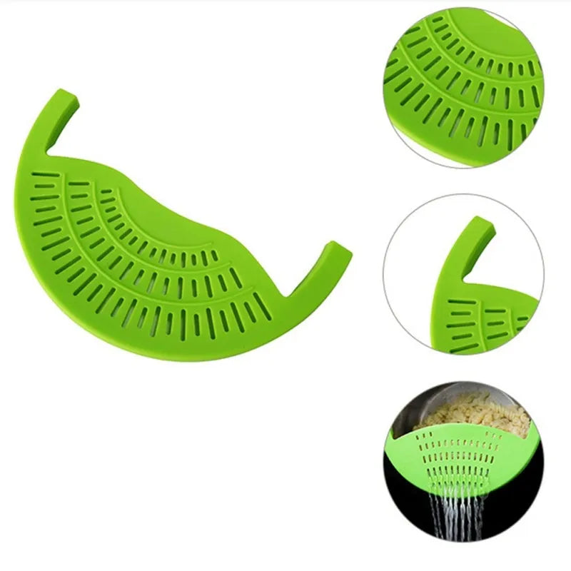Black silicone food oil drainer snapped onto a pot rim, with liquid being poured off