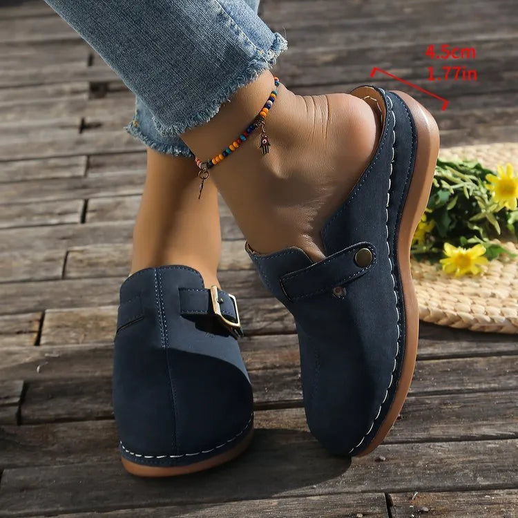 Women's casual wedge slipper in light brown with cloth upper and rubber sole