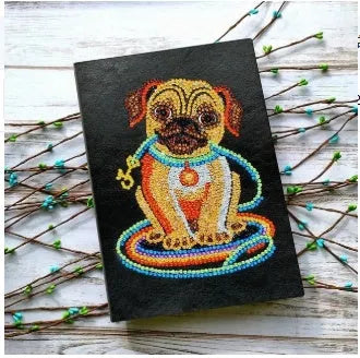 Black A5 DIY diamond painting notebook showing soft-touch cover and blank pages for craft projects