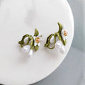 Women's sterling silver needle camellia flower earrings set with stud and clip options