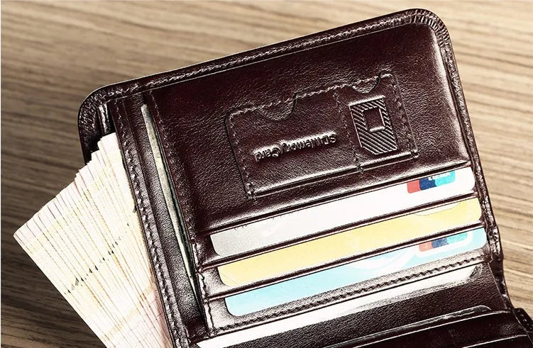 Men's leather wallet showing internal compartments for cards, cash, coins and documents