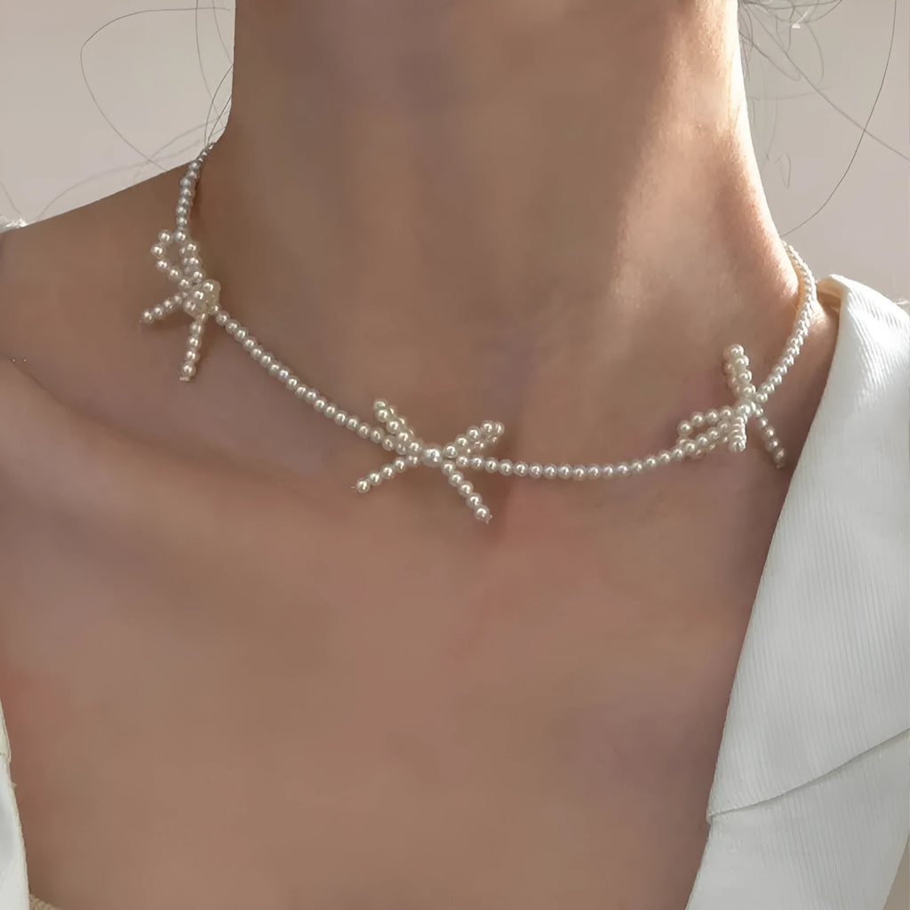 Women's sweet bow pearl necklace with geometric design on adjustable 31-40cm chain