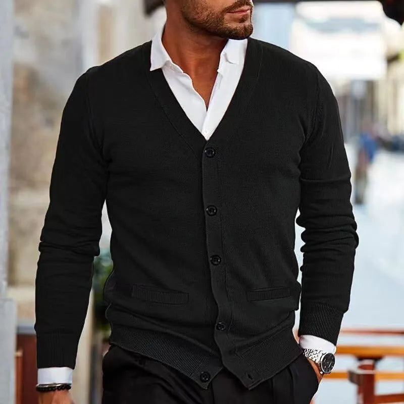 Men's slim fit acrylic cardigan sweater coat in dark grey, shown open over a t-shirt.