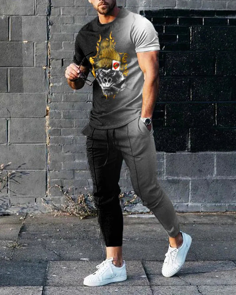 Men's slim-fit two-piece sports suit with short sleeve printed t-shirt and matching trousers in polyester blend fabric