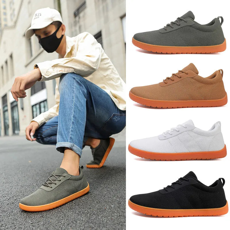 Men's black Flyknit casual walking shoes with round wide toe and rubber sole.