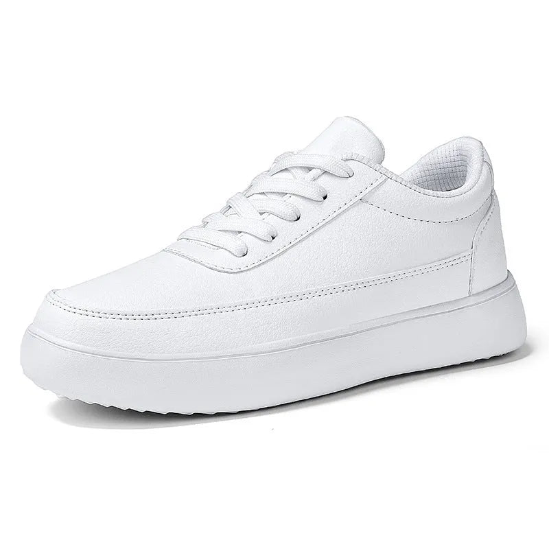 Women's white leather lace-up casual flat shoes on a solid background.