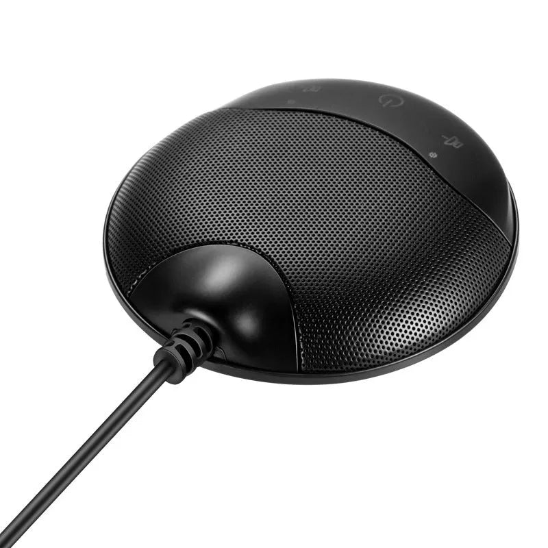 Black cube-shaped A7 USB condenser microphone on a desktop next to a computer.