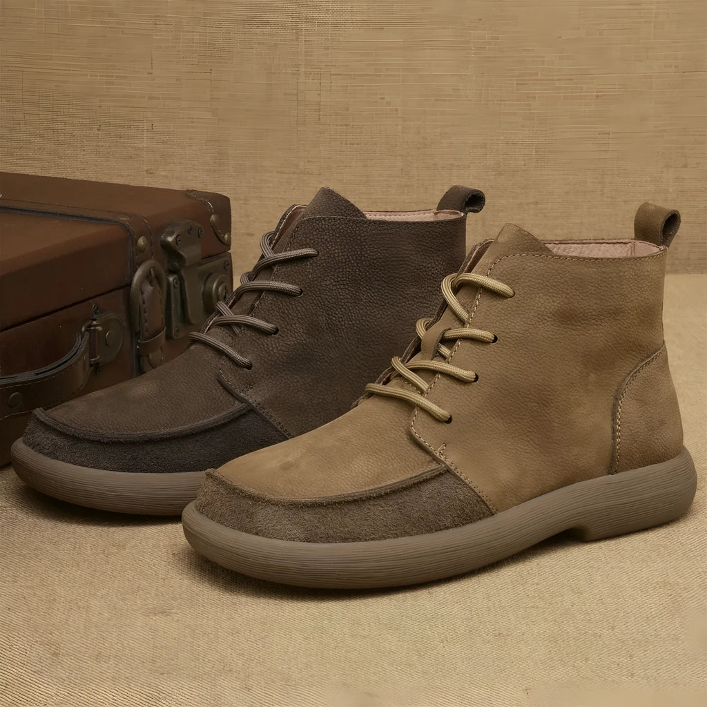 Women's grey genuine leather Martin boots with wedge heel and lace-up front.