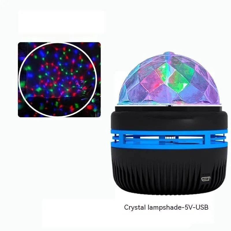 Mini crystal magic ball projector showing starry sky projection effects with USB cable