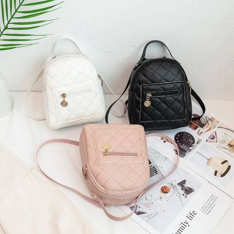 Korean-style embroidered PU school backpack in black with sandwich pockets and soft carry handles