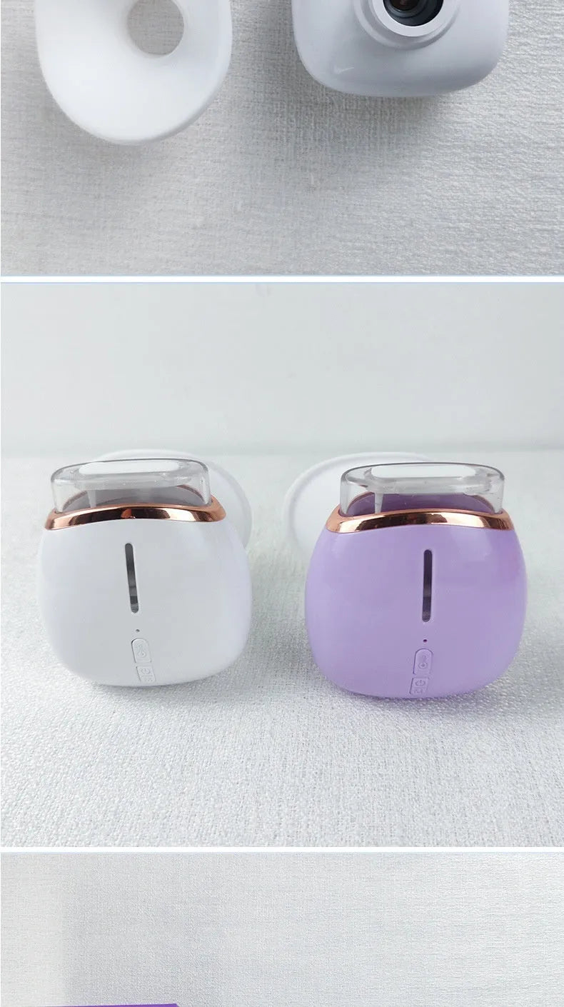 White or purple portable eye humidifier device with USB charging cable