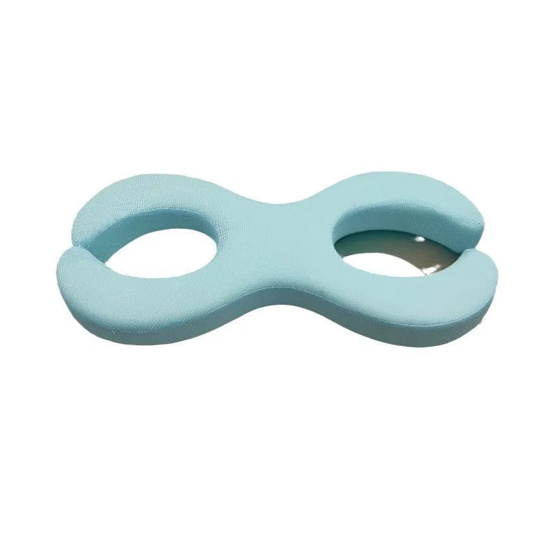 Cool blue memory foam cervical pillow with cylindrical traction design for neck support.