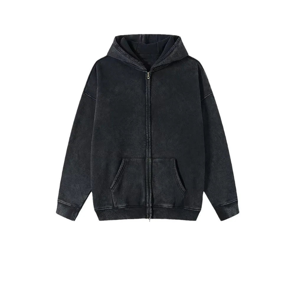 Man wearing a washed black hooded cardigan with a double zipper and fleece lining