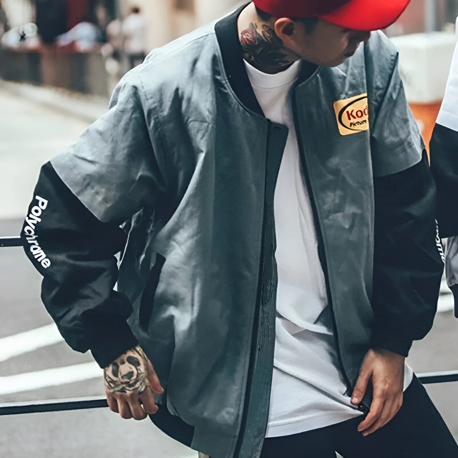 Hip hop style unisex cotton baseball jacket in grey with round neck and side slit pockets