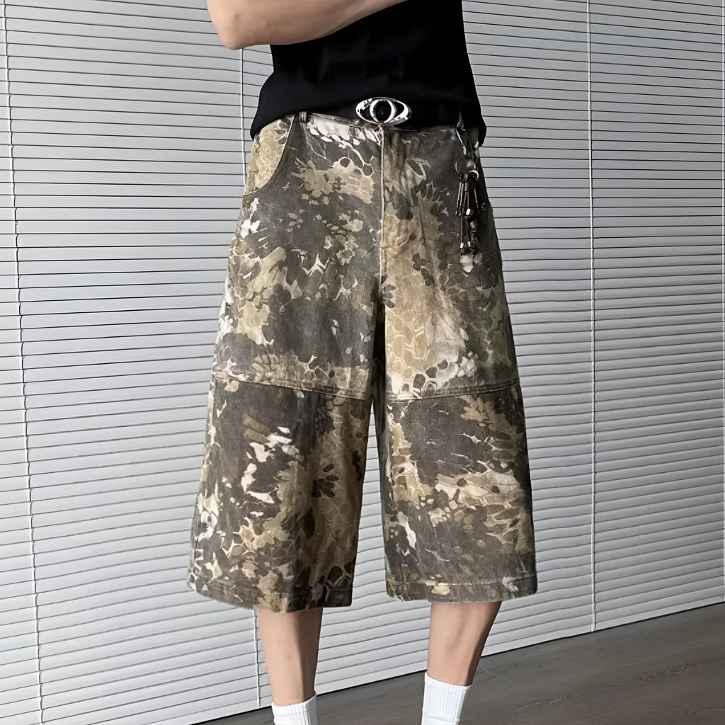 Yellow snake camouflage pattern on cropped denim jeans