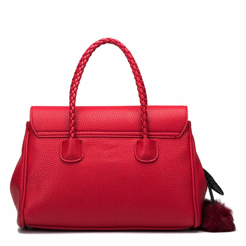 Women's lychee pattern cowhide leather handbag with crossbody strap, 31cm width, 13.5cm thickness, 22cm height, available in black colour option