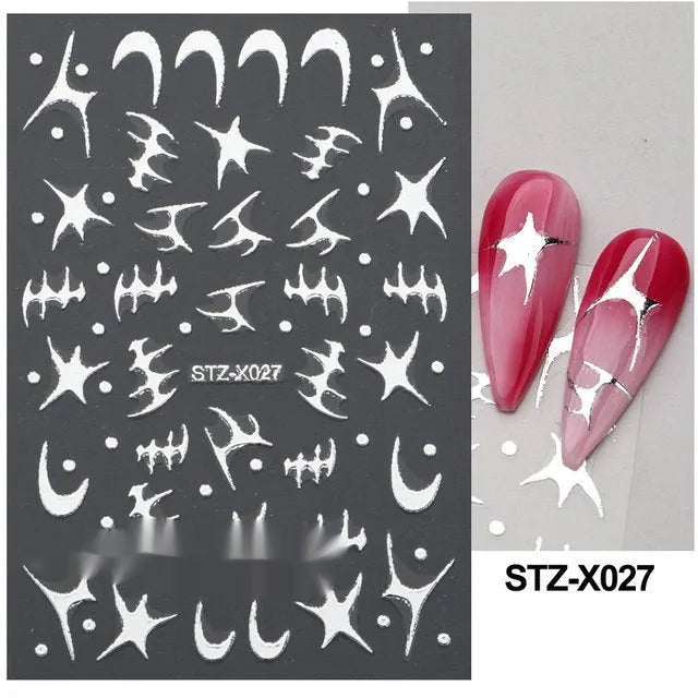 Sheet of black and silver strip nail art stickers with cartoon and love heart designs