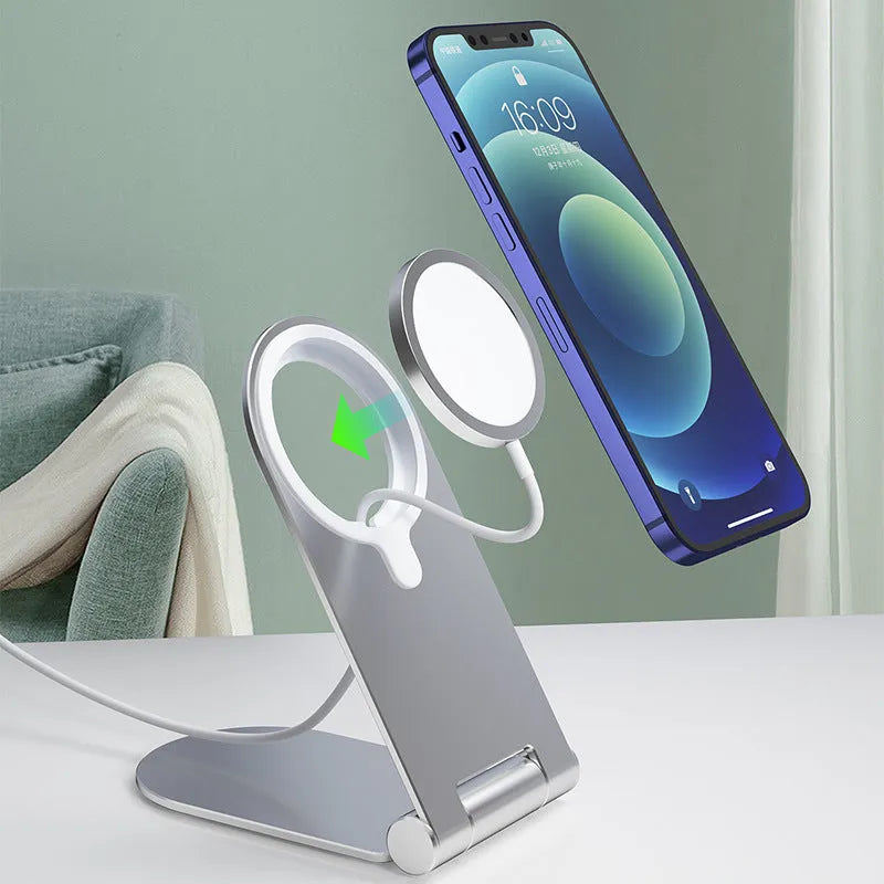 Silver aluminium alloy magnetic phone bracket for iPhone 12 showing adjustable vertical positioning