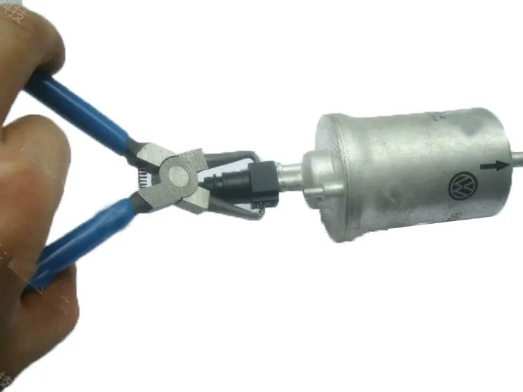 Iron caliper tubing pliers with rubber-coated handles and specialised jaws for fuel line connectors.