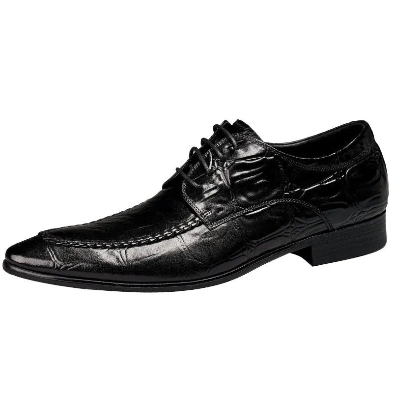 Men's black leather shoes with alligator print texture and a silver horse bit buckle.