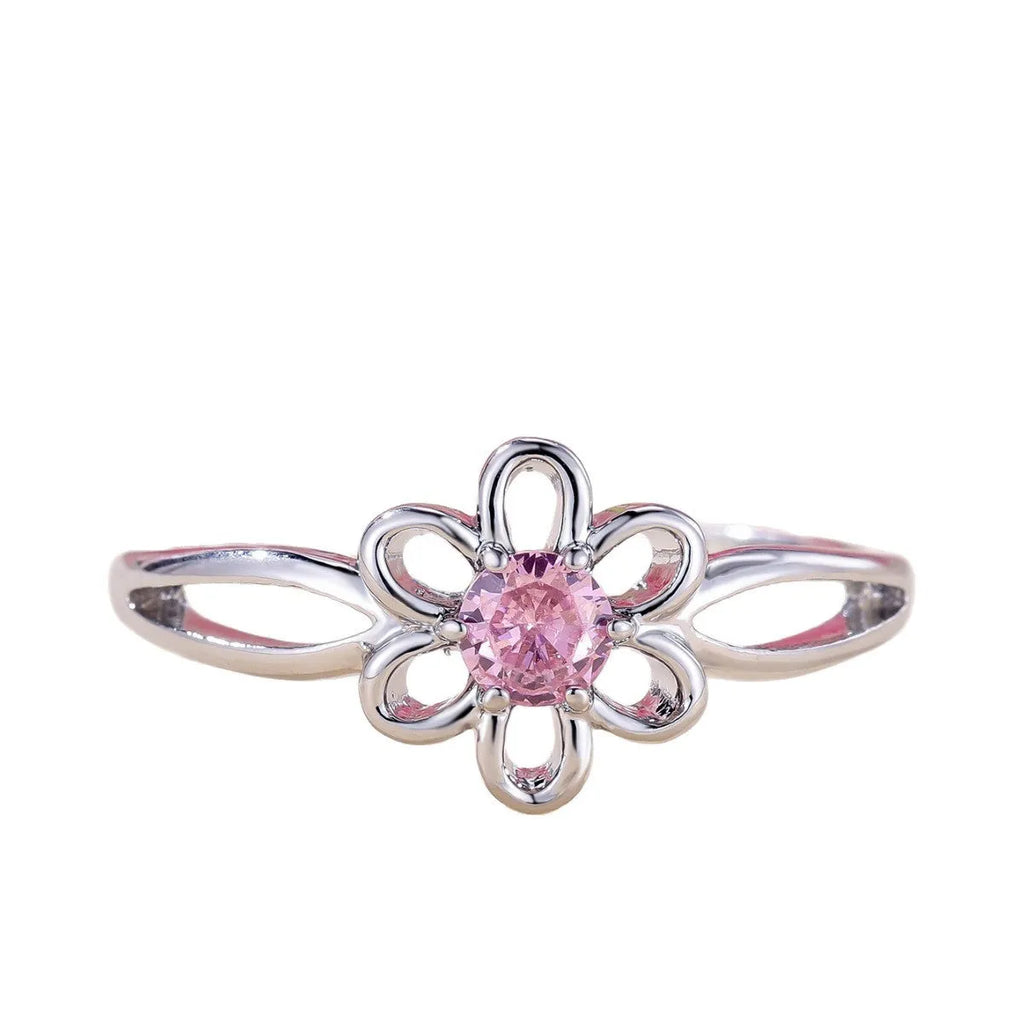 Women's hollow floral fashion ring in electroplated copper with a choice of metallic finishes.