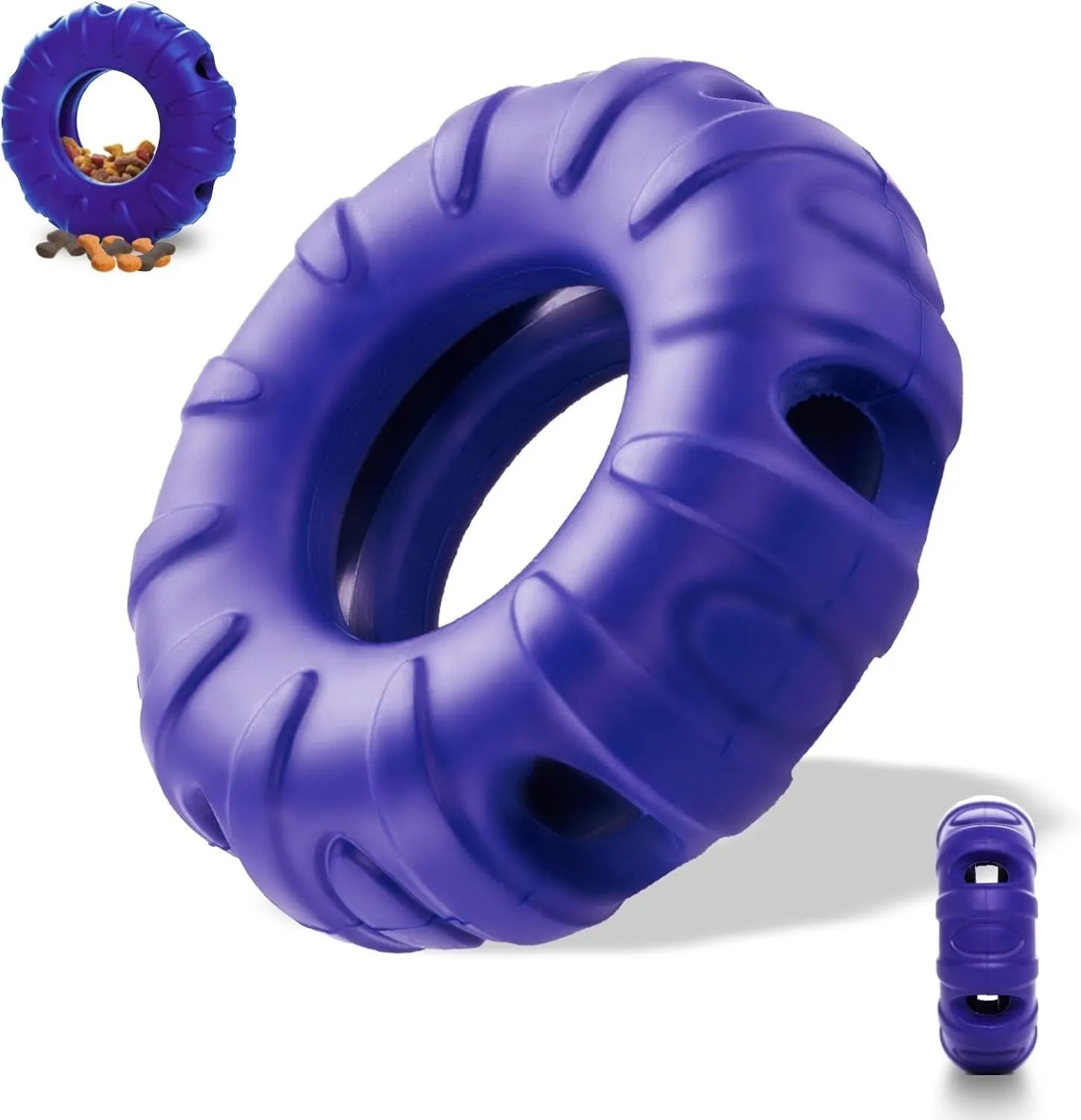 Blue tyre-shaped dog chew toy with oval openings for treat dispensing on a wooden floor.