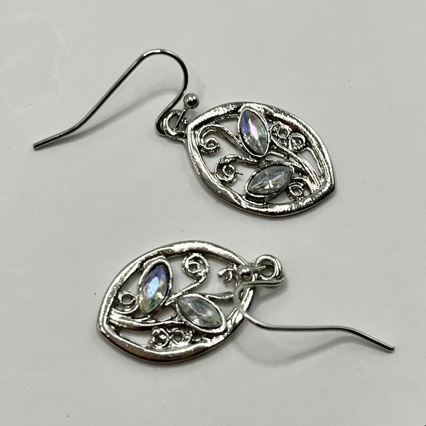 Silver-coloured leaf earrings with embedded colourful moonstones, drop design for women