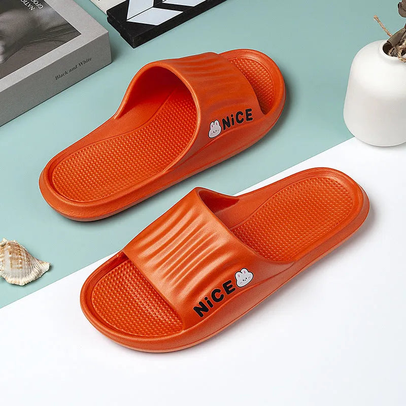 Cartoon pattern EVA flip flop slippers available in six colours for adult bathroom use