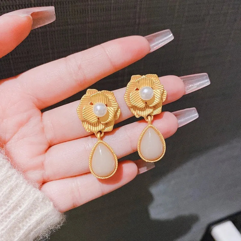 Gold electroplated Hong Kong style flower stud earrings with rose pearl opal centre and ice flower detailing