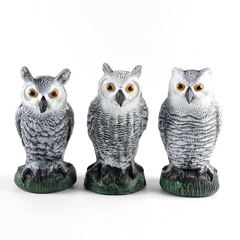 Three-piece set of red artificial PE plastic owl garden ornaments on a white background