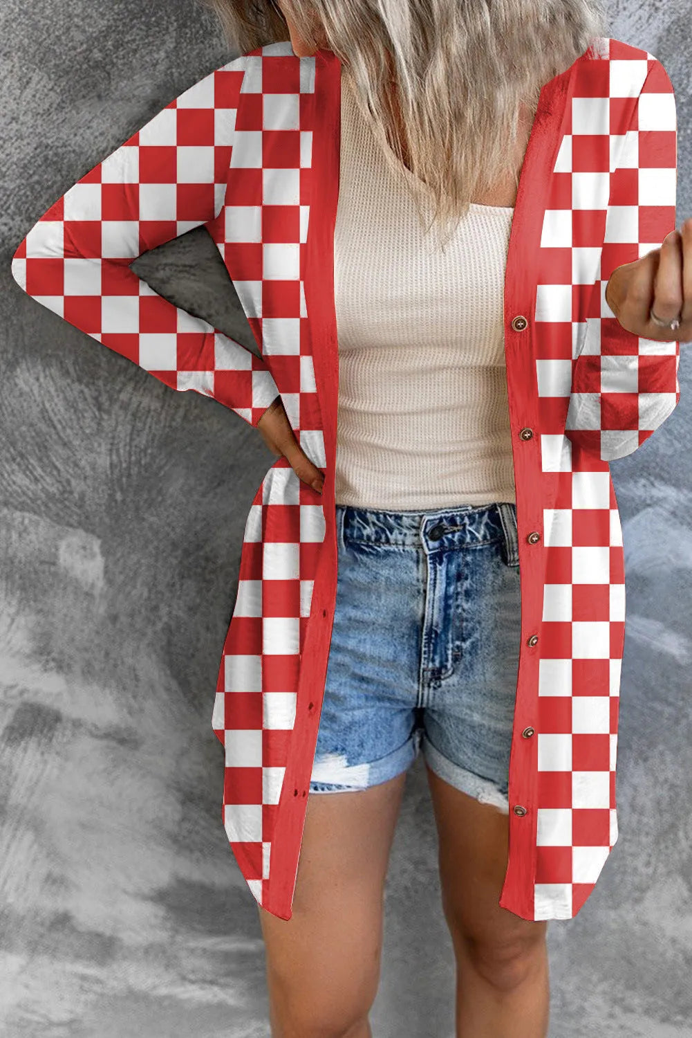 Women's long plaid cardigan coat in loose knitted construction with contrast colour pattern
