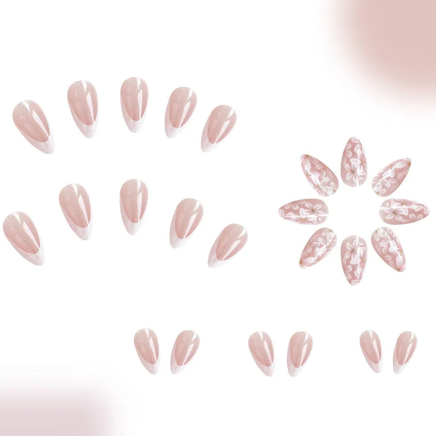 Short almond shaped artificial nails with French style and glittering powder flower design in C625 colour