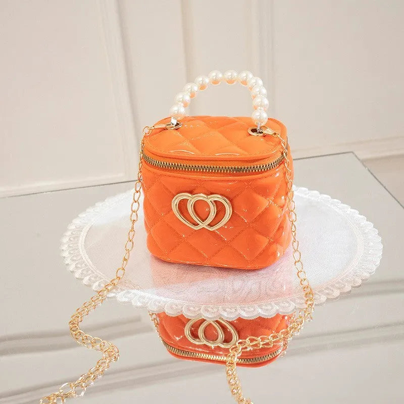 Transparent PVC jelly bucket handbag with heart pattern in multiple colour options