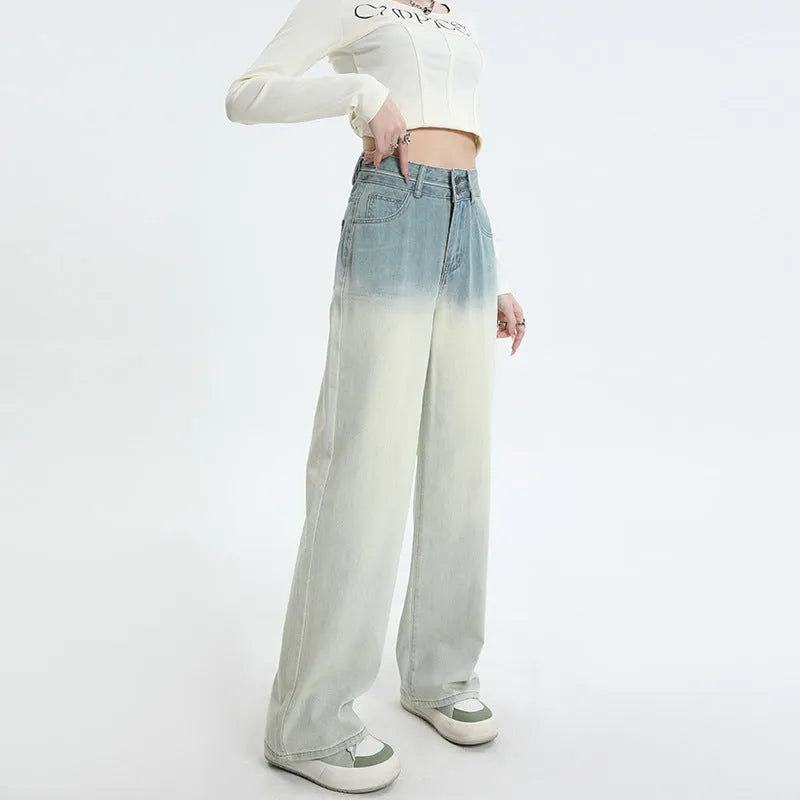 Women's gradient blue straight-leg denim trousers with wide leg silhouette on hanger